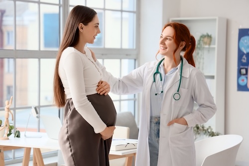 Ob trained family doctor talking to a patient
